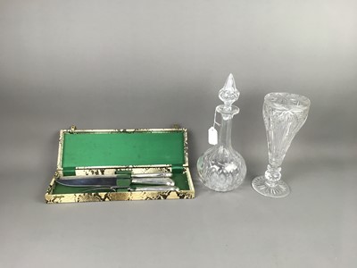 Lot 499 - A CUT GLASS DECANTER, ALONG WITH A VASE