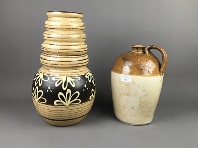 Lot 512 - A STONEWARE SPIRIT FLASK