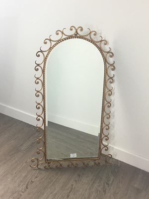 Lot 541 - AN ARCHED BEVELLED WALL MIRROR