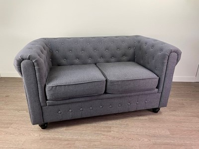 Lot 586 - A MODERN GRAY TWO SEAT BUTTON BACK SETTEE