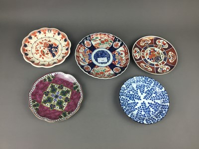 Lot 558 - AN IMARI PLAQUE AND A GROUP OF ASIAN DECORATIVE PLATES