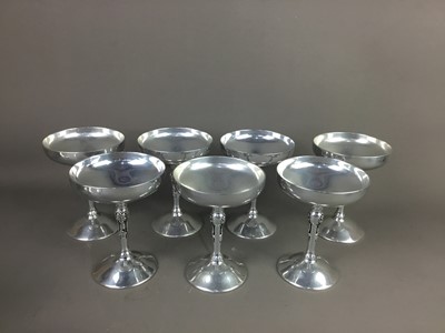 Lot 206A - A SET OF TWELVE PLATED CHAMPAGNE GOBLETS