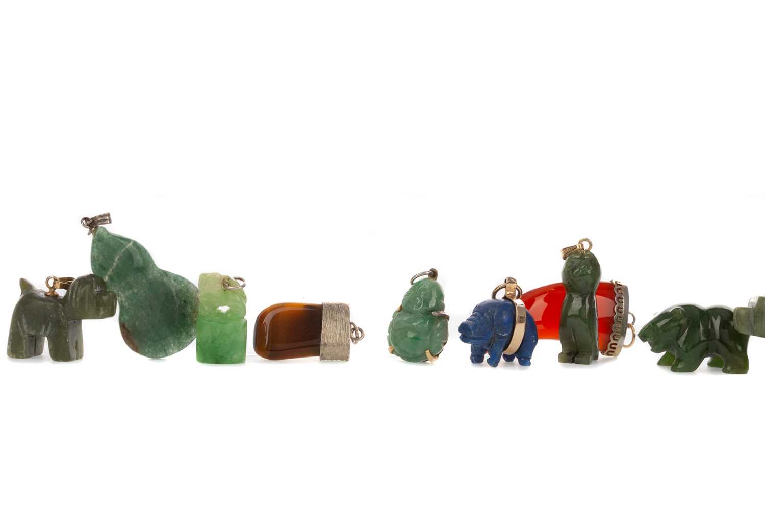 Lot 433 - A COLLECTION OF HARDSTONE PENDANTS