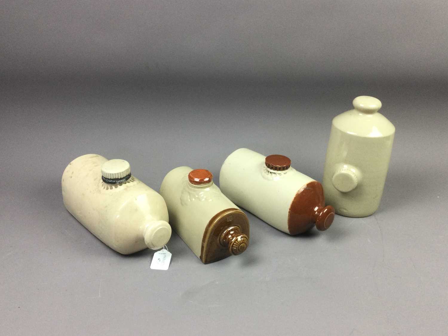 Lot 67 - A LOT OF EIGHT STONEWARE HOT WATER BOTTLES