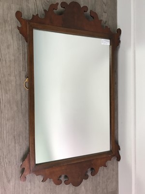 Lot 69 - A GEORGE III STYLE FRETTED MIRROR AND A MAHOGANY OPEN BOOKCASE