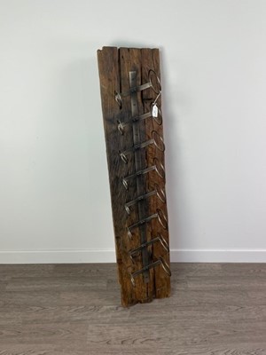 Lot 136 - A HARDWOOD WALL MOUNTING WINE BOTTLE STAND