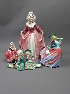 Lot 186 - A ROYAL DOULTON FIGURE OF 'AUTUMN BREEZES' ALONG WITH FOUR OTHER CERAMIC FIGURES
