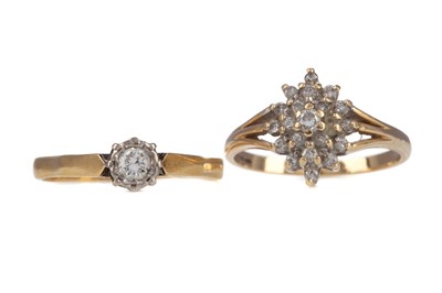 Lot 809 - A DIAMOND CLUSTER RING AND A DIAMOND SOLITAIRE RING