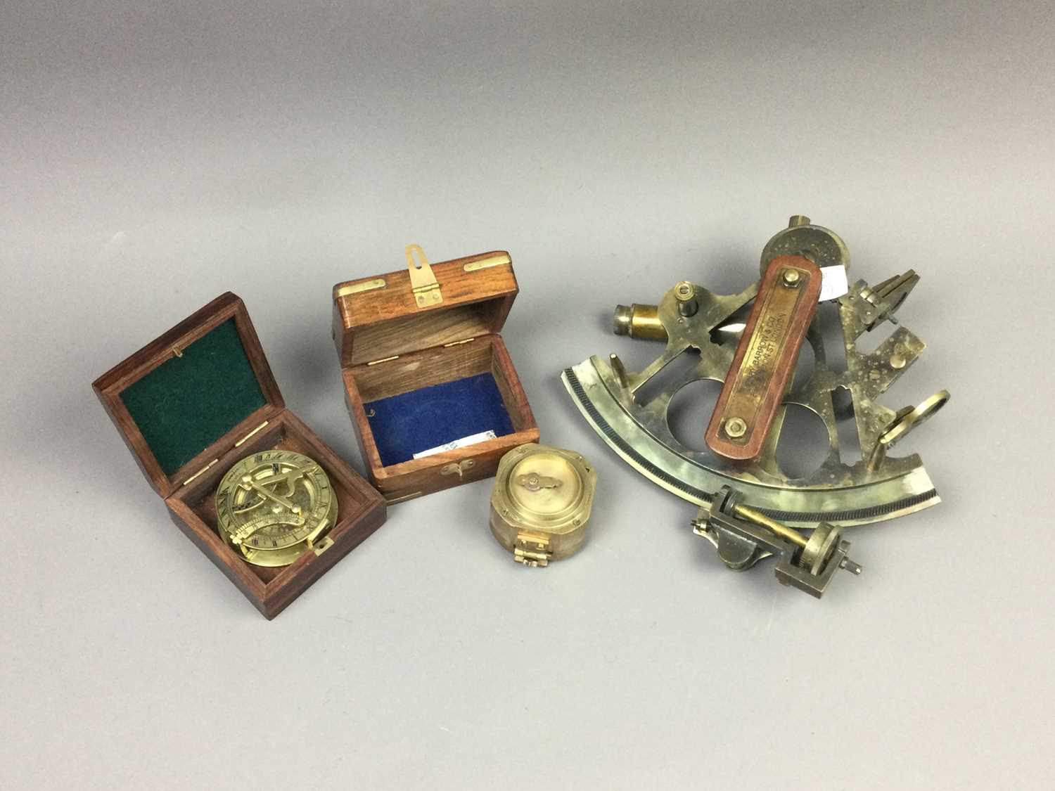 Lot 264 - A NAVAL STYLE SEXTANT, A STANLEY COMPASS AND ANOTHER