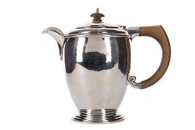 Lot 441 - A GEORGE V HAMMERED SILVER HOT WATER POT