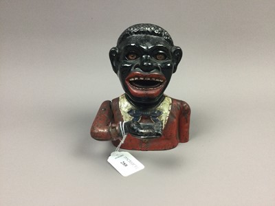 Lot 288 - A NOVELTY VINTAGE MONEYBANK