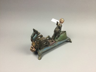 Lot 289 - A NOVELTY MONEY BANK