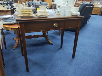 Lot 307 - A GEORGE III MAHOGANY TURNOVER TEA TABLE