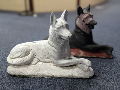 Lot 392 - A PAIR OF RECONSTITUTED STONE GERMAN SHEPHERD GARDEN ORNAMENTS
