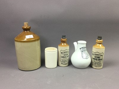 Lot 386 - A LOT OF NINE STONEWARE JARS AND A CERAMIC INHALER
