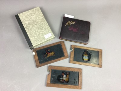 Lot 418 - A LOT OF THREE VICTORIAN MOVEABLE MAGIC LANTERN SLIDES