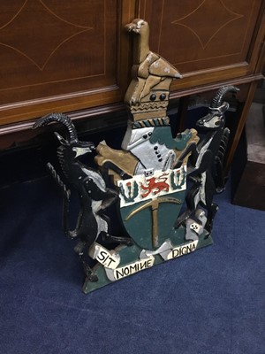 Lot 424 - A RHODESIA INTEREST PAINTED CAST METAL CREST