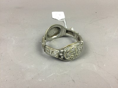 Lot 431 - A PERSIAN SILVER BANGLE