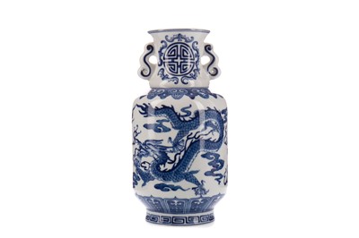 Lot 1650 - A 20TH CENTURY CHINESE PORCELAIN TWIN-HANDLED VASE