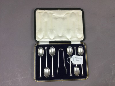 Lot 552 - A SET OF SIX SILVER COFFEE SPOONS AND TONGS IN FITTED CASE