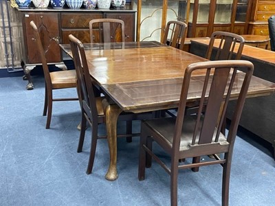 Lot 524 - A MAHOGANY BREAKFORNT SIDEBOARD, DINING TABLE AND SIX CHAIRS