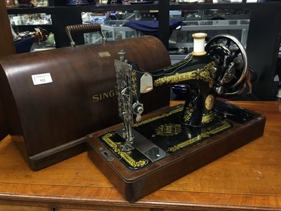 Lot 522 - A PORTABLE SEWING MACHINE