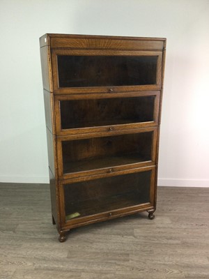 Lot 1345 - AN EARLY 20TH CENTURY BARRISTER’S OAK SECTIONAL BOOKCASE