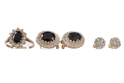 Lot 994 - A BLACK AND WHITE GEM SET PENDANT AND TWO PAIRS OF EARRINGS