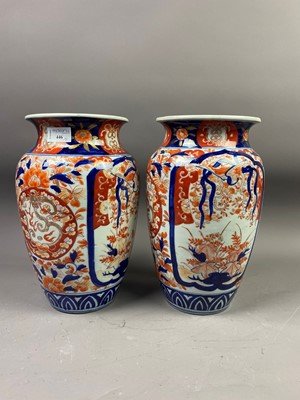 Lot 446 - A PAIR OF 20TH CENTURY JAPANESE IMARI PATTERN VASES