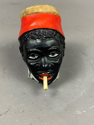 Lot 445 - A VINTAGE NOVELTY PIN CUSHION/TAPE MEASURE