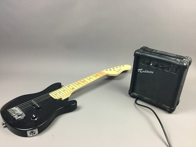 Lot 590 - A CHILD'S ELECTRIC GUITAR, ALONG WITH AN AMP