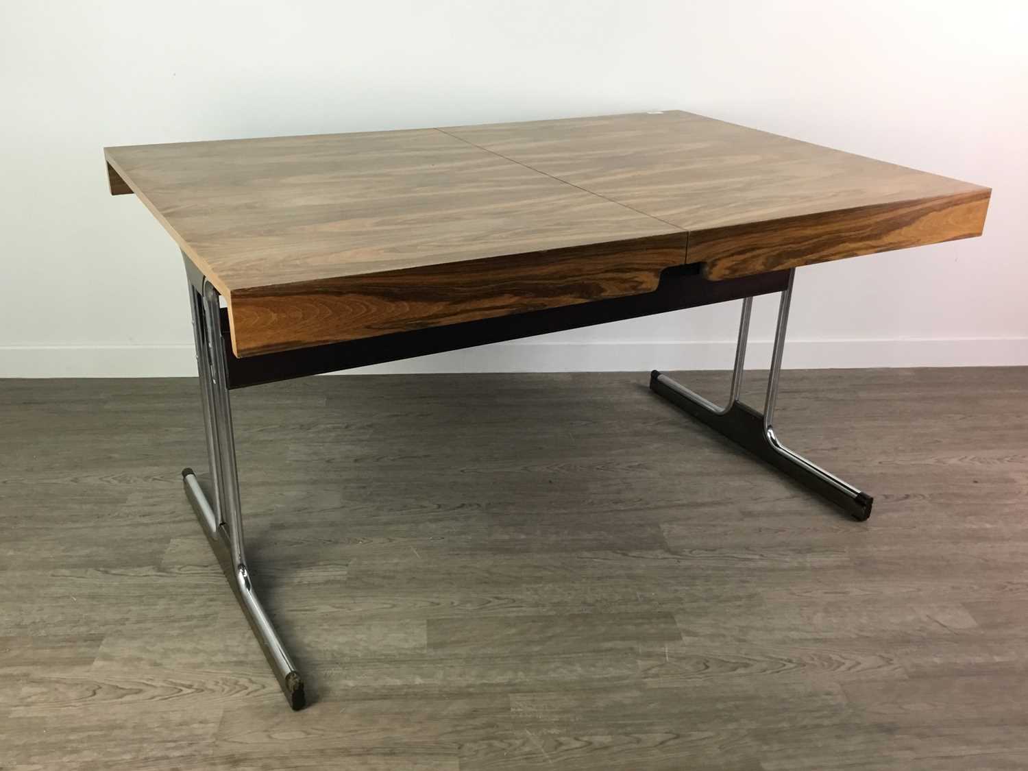 Lot 1360 - A MID-20TH DESIGN CENTURY ROSEWOOD EFFECT EXTENDING DINING TABLE