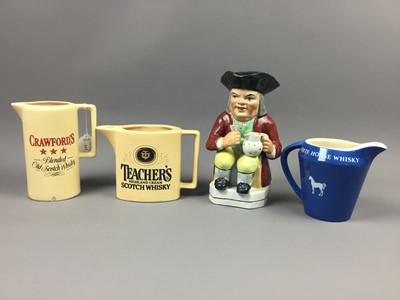 Lot 515 - A LOT OF TWELVE WHISKY WATER JUGS AND CHARACTER JUGS