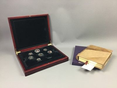 Lot 517 - A THREE CASED COINS SETS