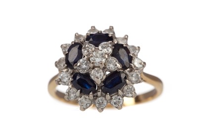 Lot 849 - A SAPPHIRE AND DIAMOND CLUSTER RING