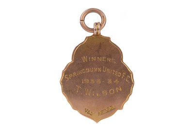 Lot 1748 - A GLASGOW JUVENILE FOOTBALL ASSOCIATION CUP GOLD MEDAL 1933/34