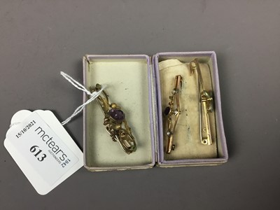 Lot 613 - A LATE VICTORIAN NINE CARAT GOLD AND AMETHYST THISTLE BROOCH AND BAR BROOCHES