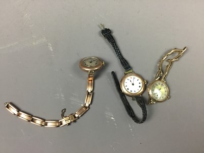 Lot 615 - A GROUP OF THREE LADY'S GOLD BRACELET WATCHES