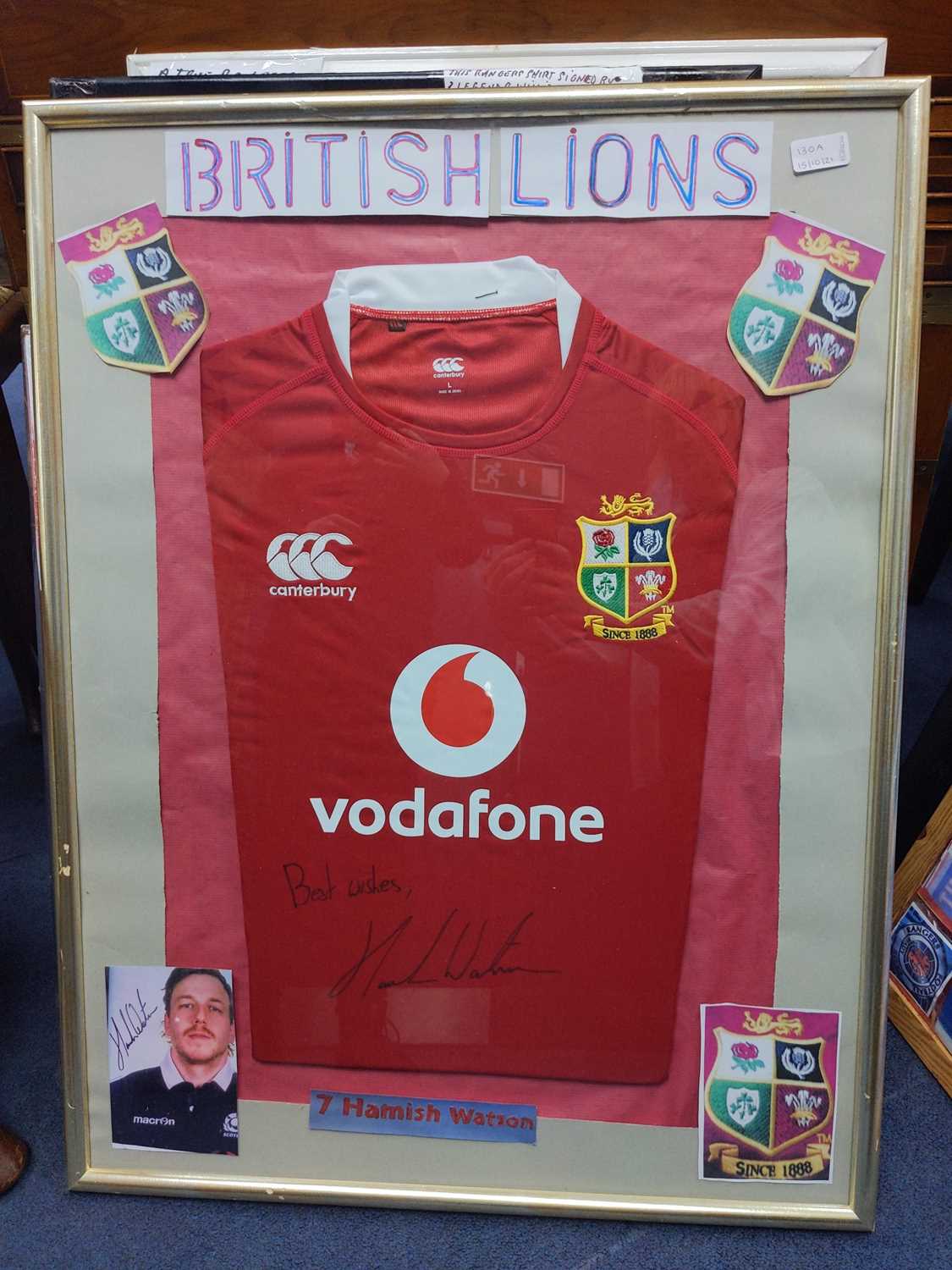 Lot 130 - A FRAMED BRITISH AND IRISH LIONS JERSEY