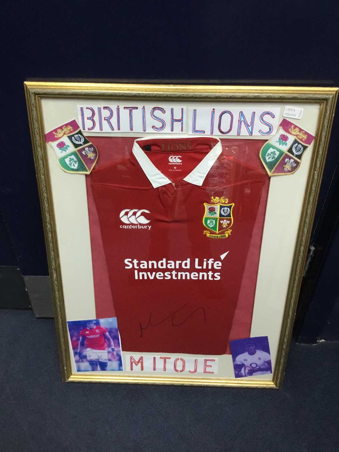Lot 135 - A FRAMED BRITISH AND IRISH LIONS JERSEY
