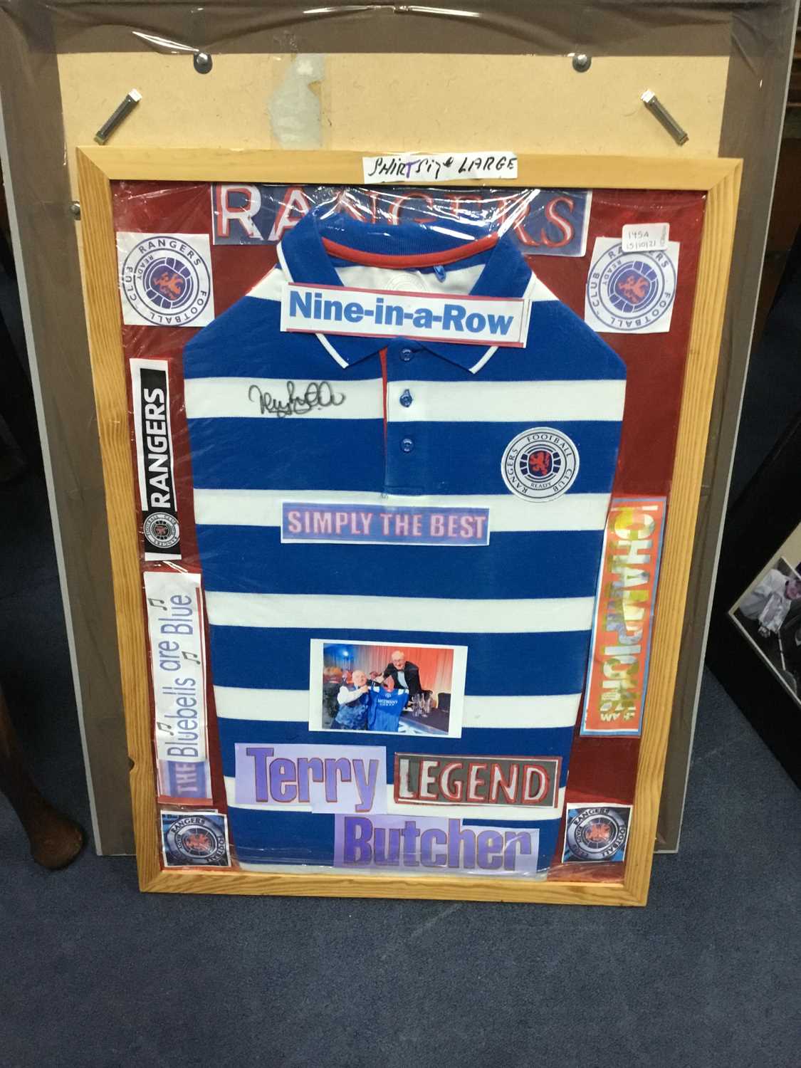 Lot 145 - A FRAMED RANGERS F. C. STRIPPED TOP