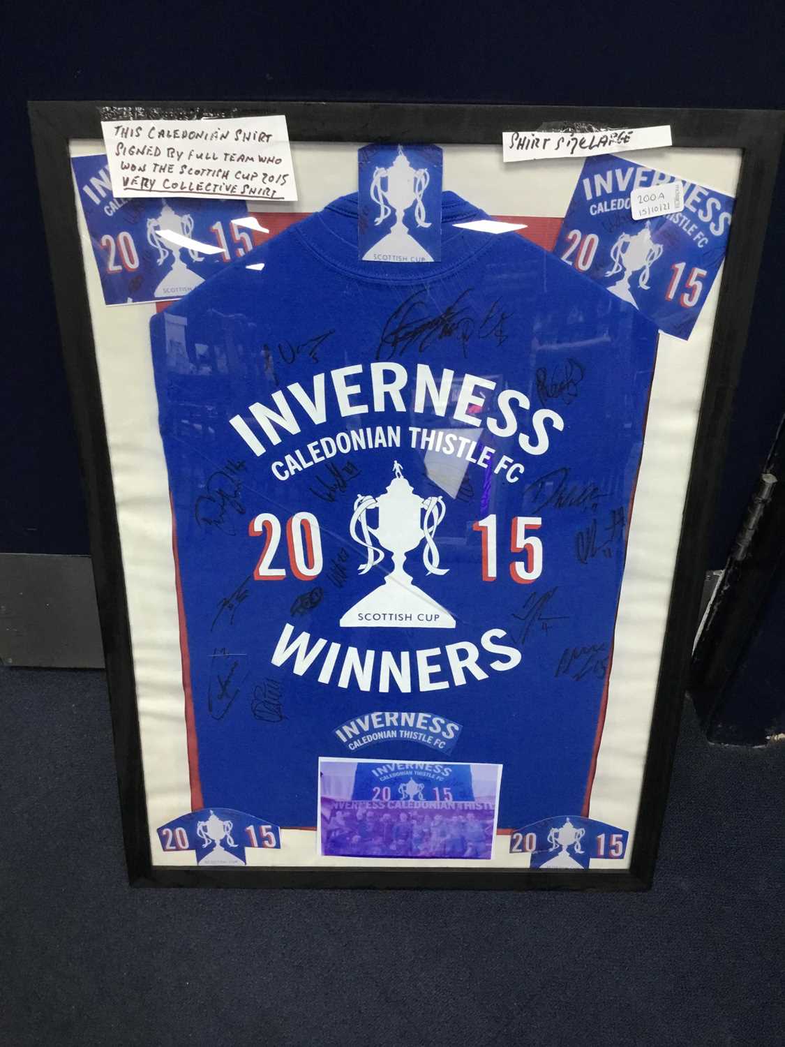 Lot 200 - A FRAMED INVERNESS CALEY T-SHIRT