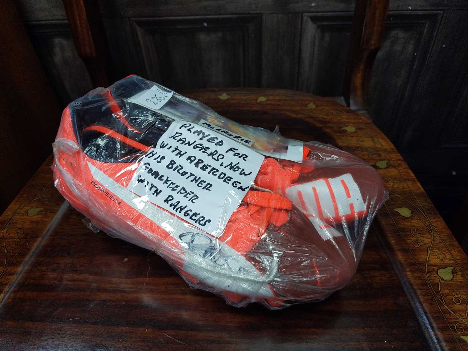 Lot 235 - A PAIR OF SIGNED FOOTBALL BOOTS