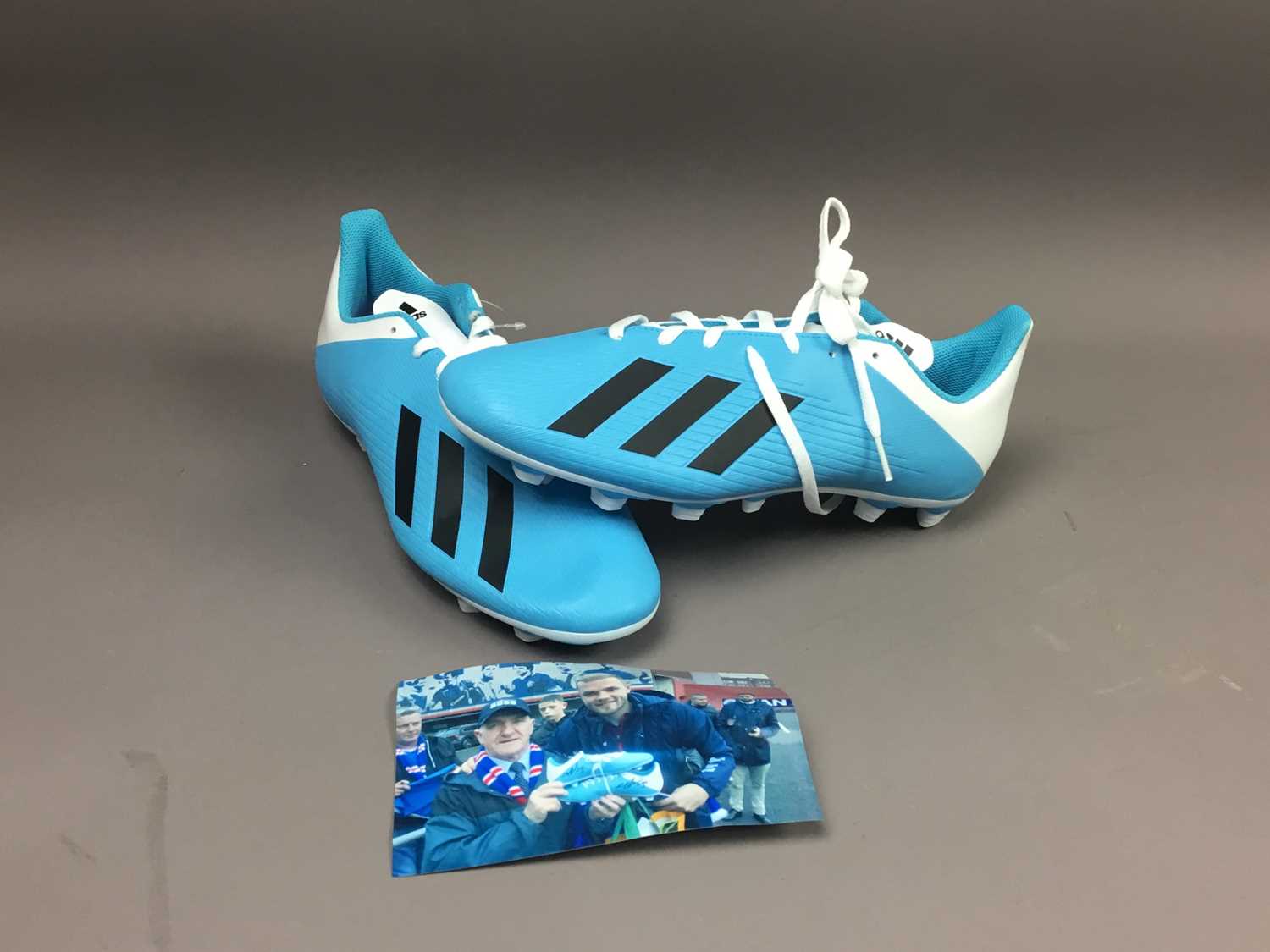 Lot 240 - A PAIR OF SIGNED FOOTBALL BOOTS