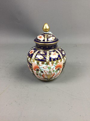 Lot 128 - A ROYAL CROWN DERBY OVOID VASE AND COVER