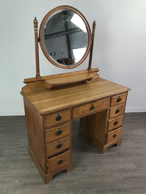 Lot 476 - AN EDWARDIAN OAK THREE DOOR WARDROBE, DRESSING CHEST AND TWO CHAIRS