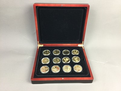 Lot 176 - A CASED SET OF TWENTY FOUR GOLD PLATED TRISTAN DA CUNHA CROWNS