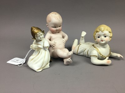Lot 23 - A GROUP OF THREE BISQUE PORCELAIN CHILD FIGURES
