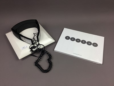 Lot 146 - A PAIR OF BANG & OLUFSEN HEADPHONES AND A BOOK