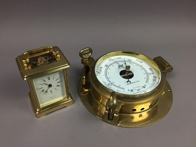 Lot 12 - A BRASS CASED CARRIAGE CLOCK AND A BAROMETER